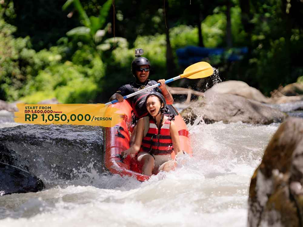 Guests paddling during an exclusive kayaking adventure on the river in Ubud, Bali with Surya Bintang Adventures.